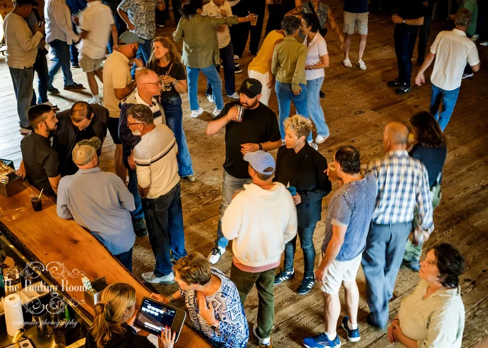 Guests gathered at the bar during Dirty Tea, seen from above