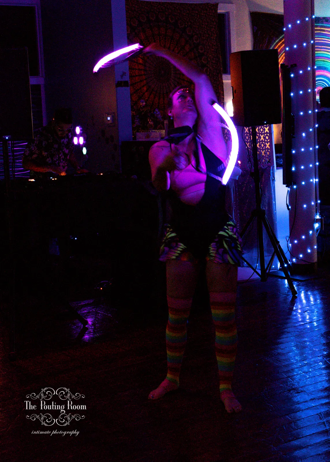 An LED hoop performer lighting up the dance floor