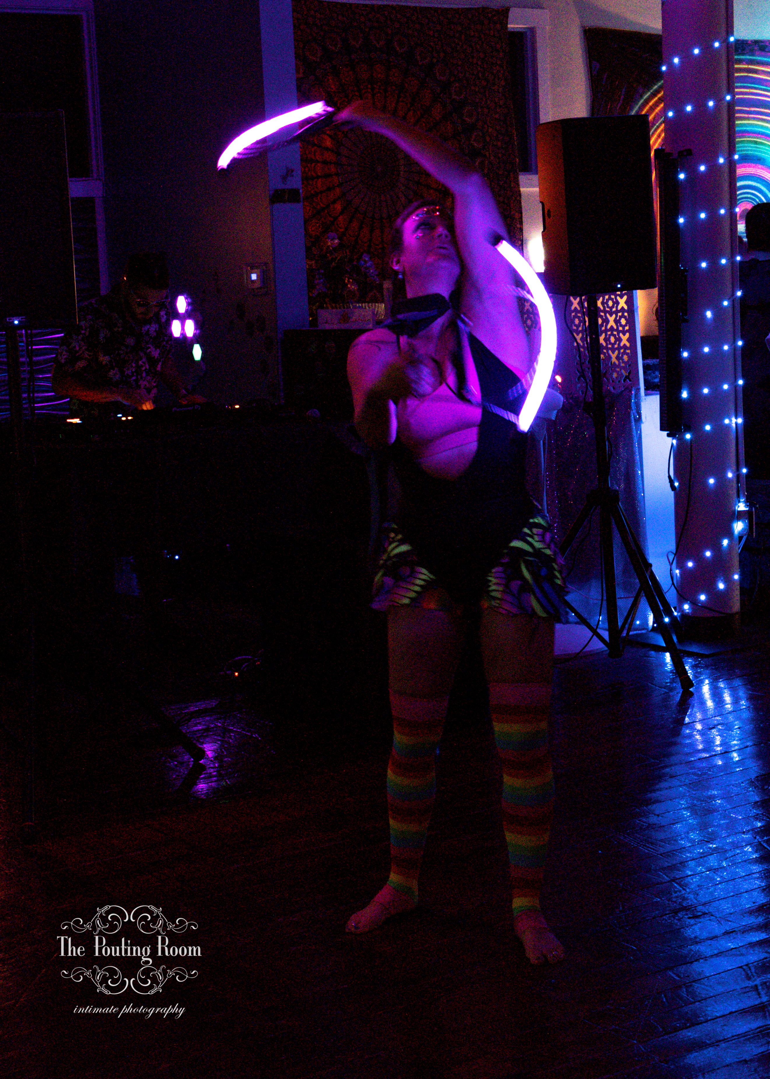 An LED hoop performer lighting up the dance floor