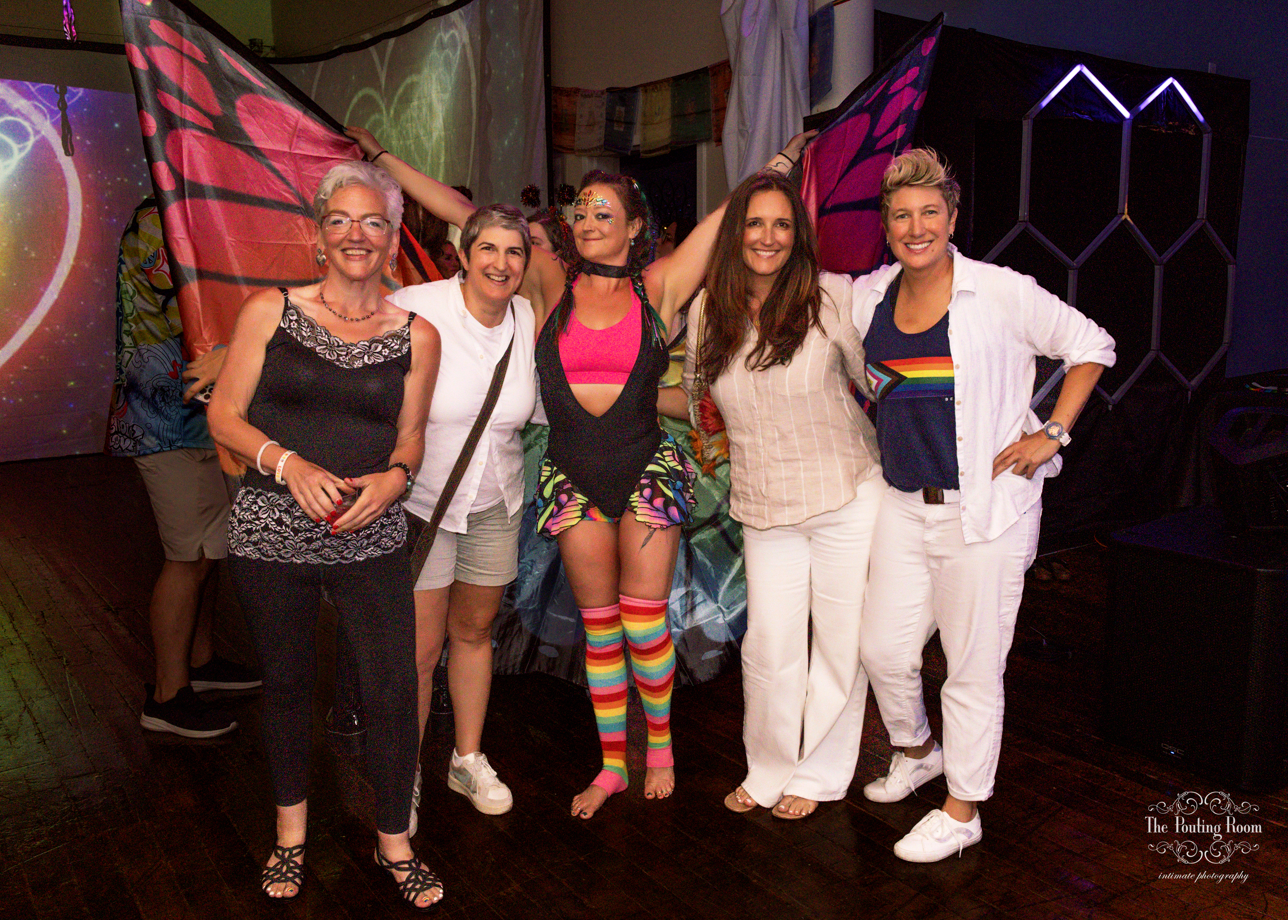Guests raising drinks and celebrating at the Inaugural Tea Dance